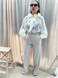 PANTALONI PALAZZO BEIGE